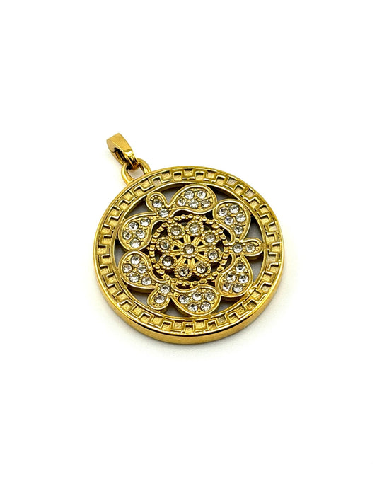 The Medallion with included gold clasp on white background
